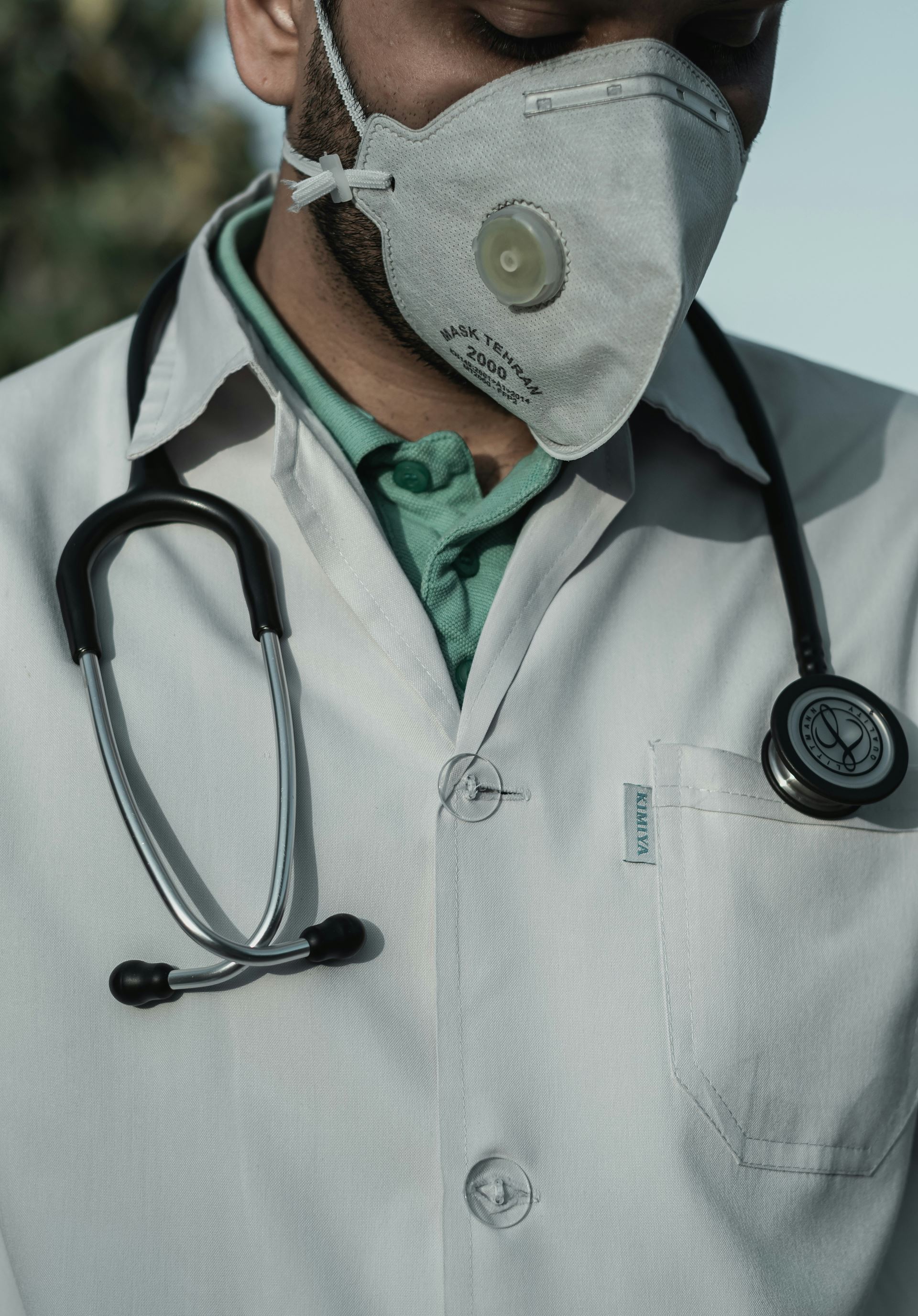 a doctor with a stethoscope around his neck